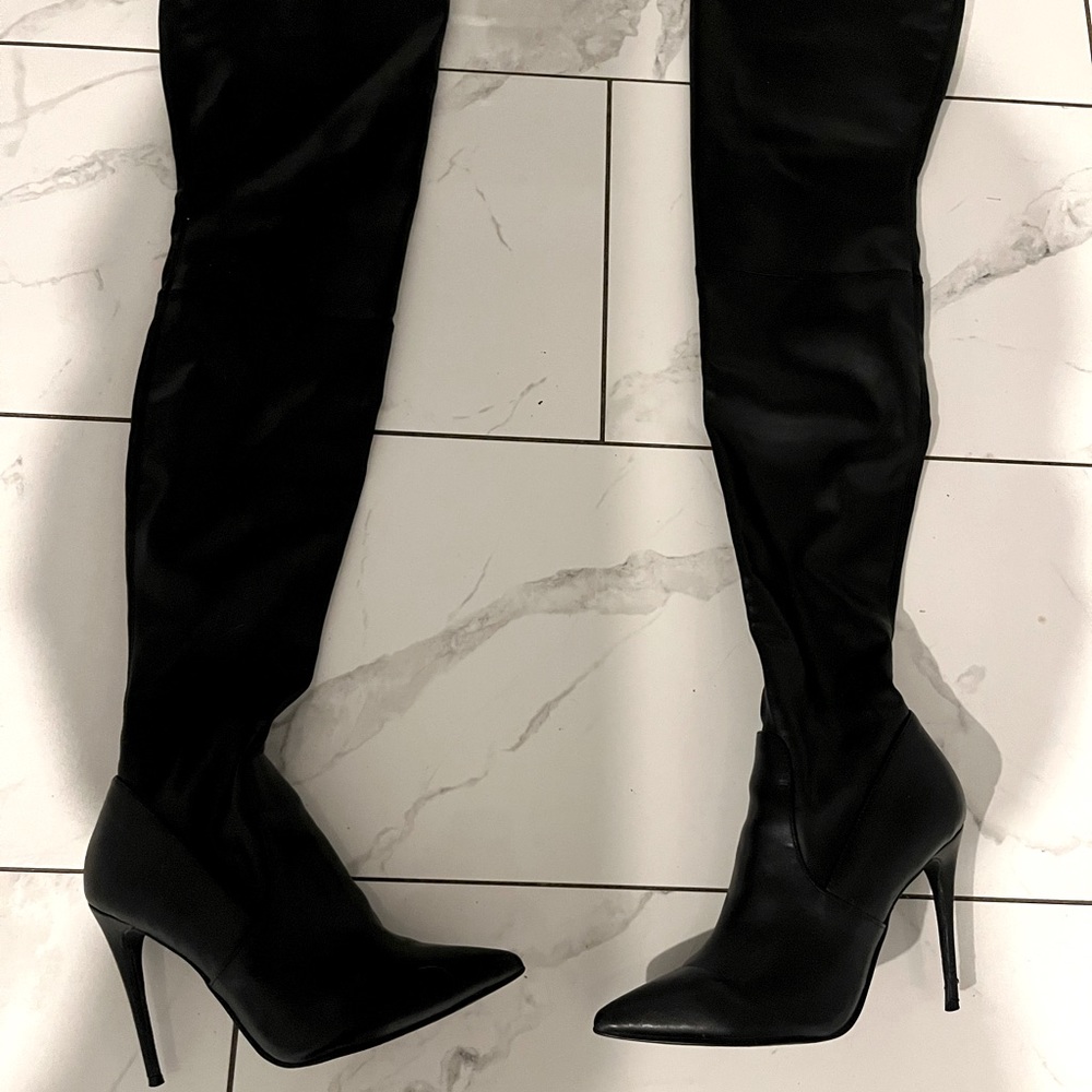 Steve Madden thigh high boots in black